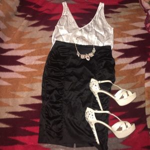 Black pencil skirt with pleaded sides