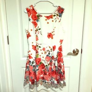 White dress with red flowers. Worn twice.