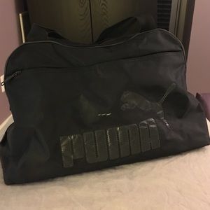 Black puma bag