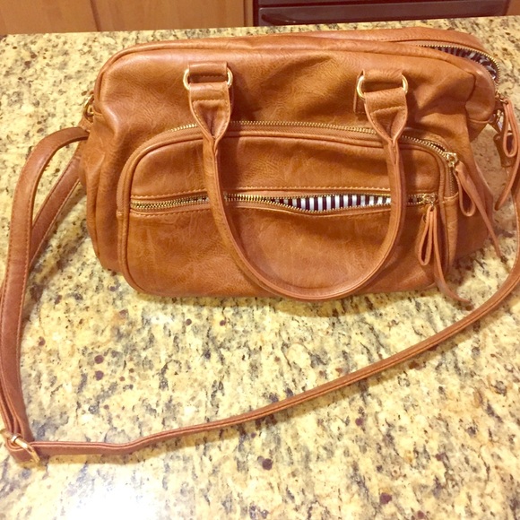 Tan purse with white/navy lining from Francesca's