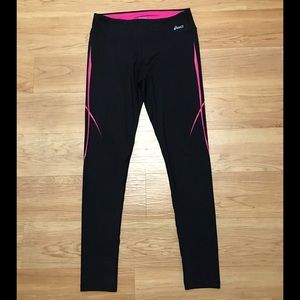 Black and pink Asics brand tights