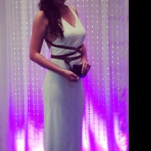 Custome made gown. No size but fit like a small.