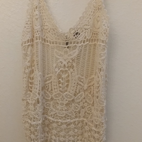 Cream/beige tank.