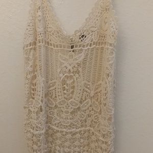Cream/beige tank.