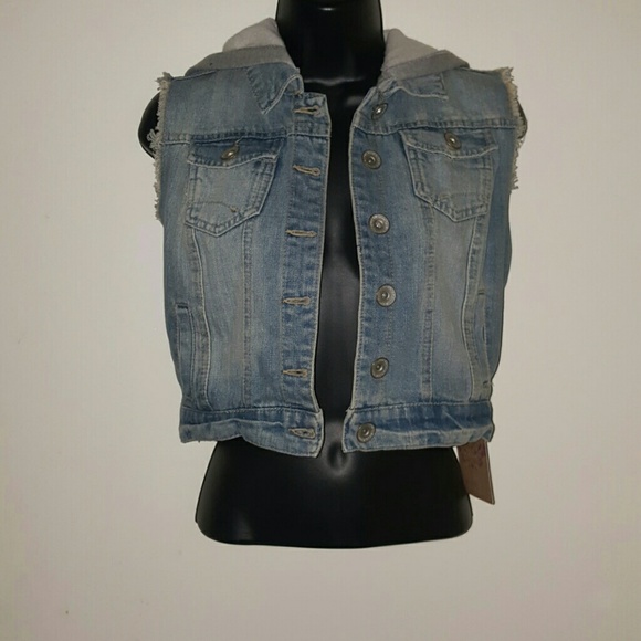 Light denium vest, tags attached.