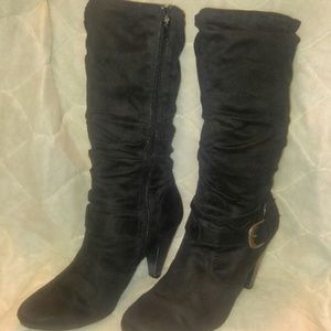Black ruffled boots by Apt9.
