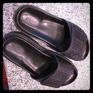 CK BLACK PERFORATED SANDALS