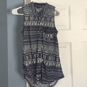 Sleeveless button down top