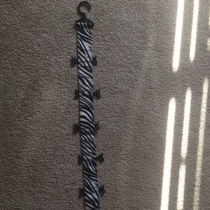 Zebra print Flip flop holder hangs  in closet
