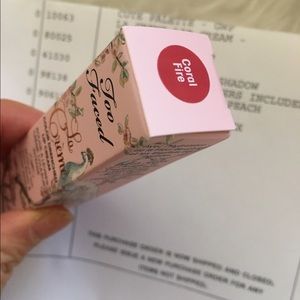 Too Faced La Creme lipstick on Coral Fire