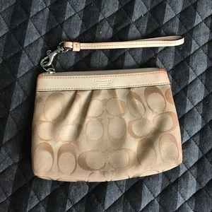 Beige coach wristlet