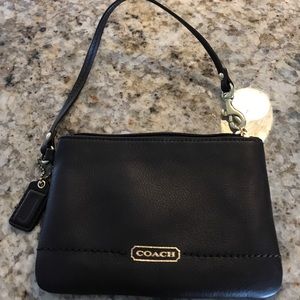 Coach small brown wristlet