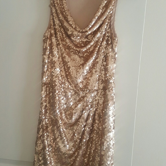 Gold dress use it once.  Feel free to make a