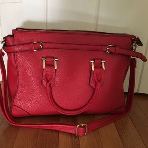 Beautiful red pebbles leather handbag.