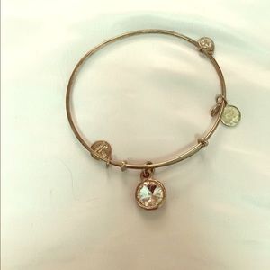 Alex & Ani bangle with April month birthstone.