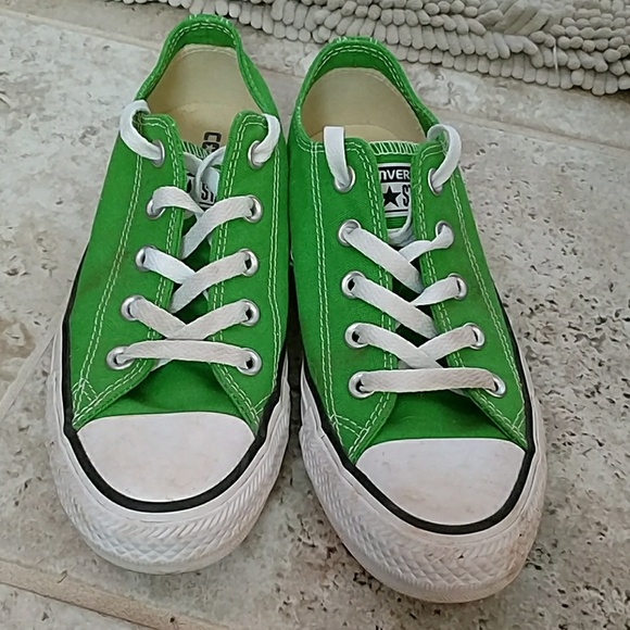 Green low top Converse sneakers
