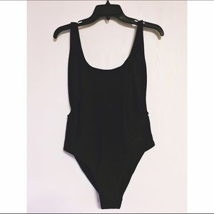 Black high-hip low back one piece