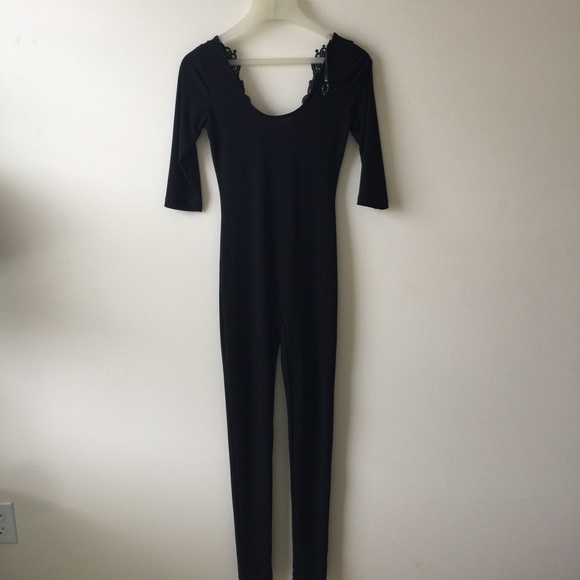 NWOT Black full body jumpsuit with lace detail