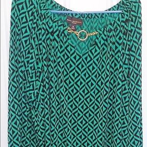 Emerald green and black tunic. Gold detail at neck