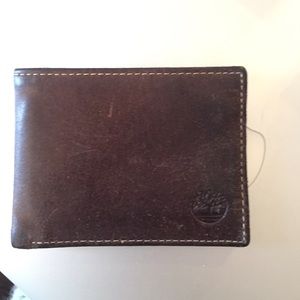 Used men's brown leather wallet
