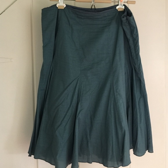 Teal knee length skirt.