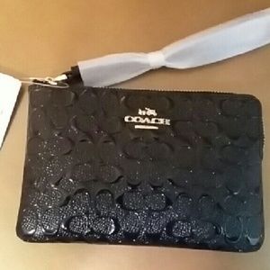 **SOLD**New Coach Wristlet In Signature Debossed