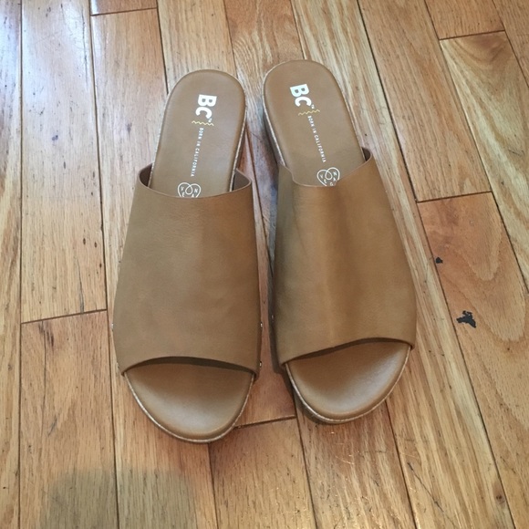 Slip on tan vegan leather with wood bottom sandals