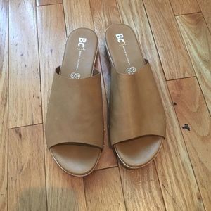Slip on tan vegan leather with wood bottom sandals