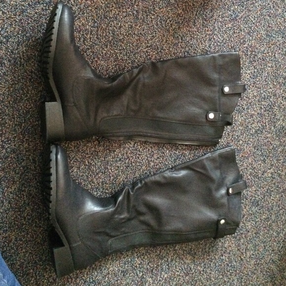 Tall black leather boots