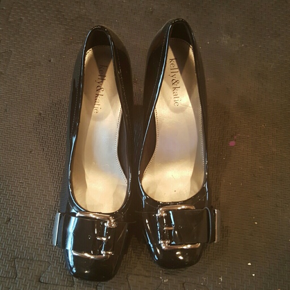 Black buckle toe heels
