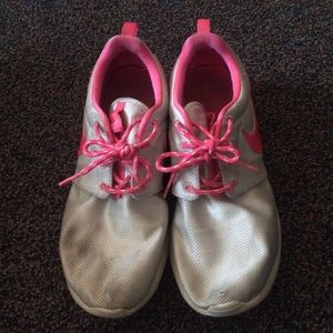 Pink and grey roshe runs