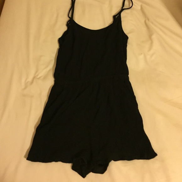 Black romper with triangle cut out in the back