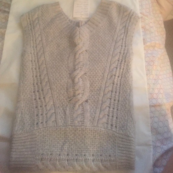 Free People knitted short sleeve sweater.