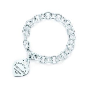 Sterling Silver Tiffany & Co heart charm bracelet