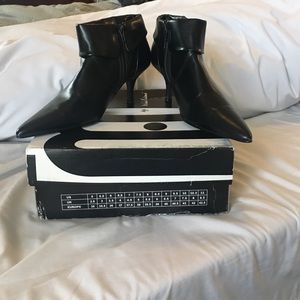 Black, pointed toe, low cut boots