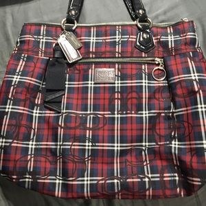 Navy and red plaid Authentic Coach purse.