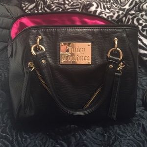 Black Juicy Couture mini hobo bag. Pink interior.