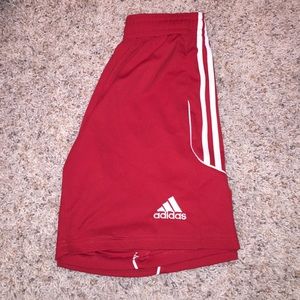 Red adidas basketball shorts