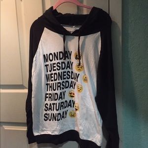 Selling a new long sleeve shirt with a hood.