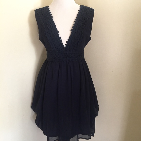 minuet Dresses & Skirts - Minuet navy blue deep v neck dress
