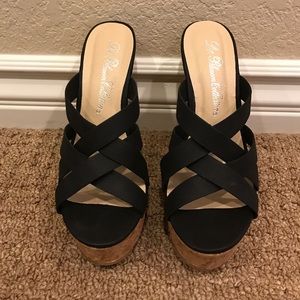 NWOT Black wedge slip on sandals from Tillys.