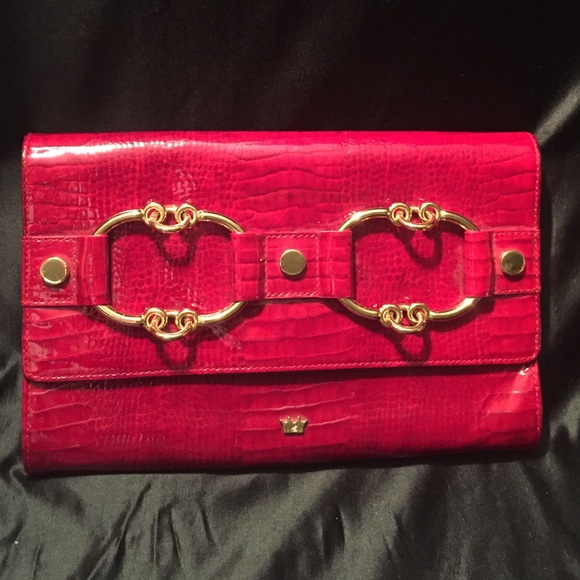 Red clutch with gold hardware