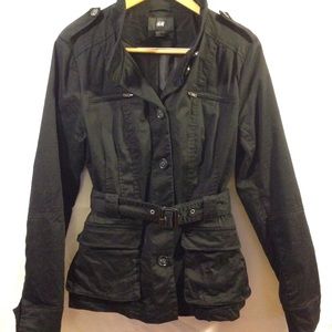 Ladies black safari jacket.