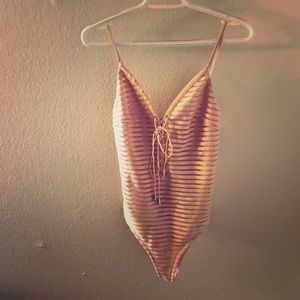 Flattering lace up bodysuit!