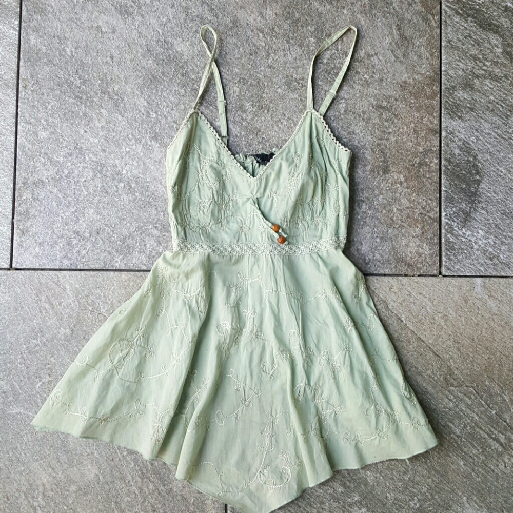 Asymmetrical Hem Tank Top with Embroidered Details