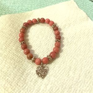 Pink beaded "Love" bracelet
