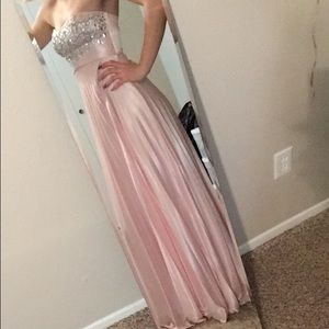 Pail pink silk dress with jeweled top.