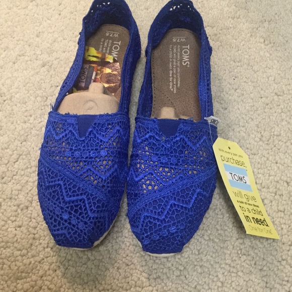 Tom's shoes. Never worn