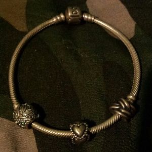 Authentic Pandora bracelet with 3 charms