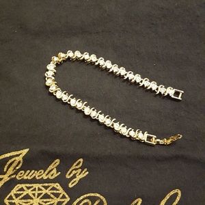 Women's tennis bracelet gold tone